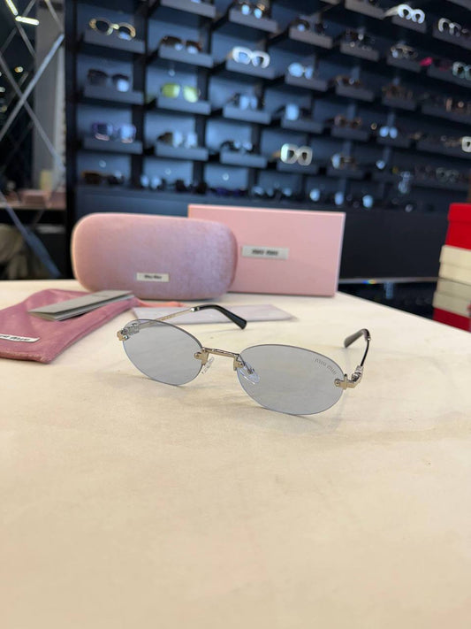 Miu Miu Rimless Oval Sunglasses Silver Frame
